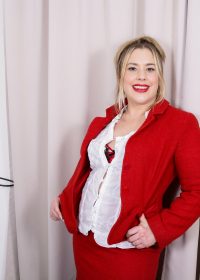 Hairy, mature housewife removes her red lingerie to reveal a wet pussy