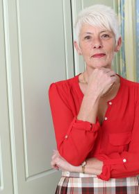 Granny in red lingerie plays with her regal body all day