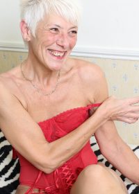 Granny in red lingerie plays with her regal body all day