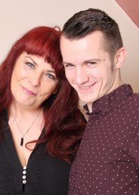 Horny redheaded housewife takes a young stud under her wing